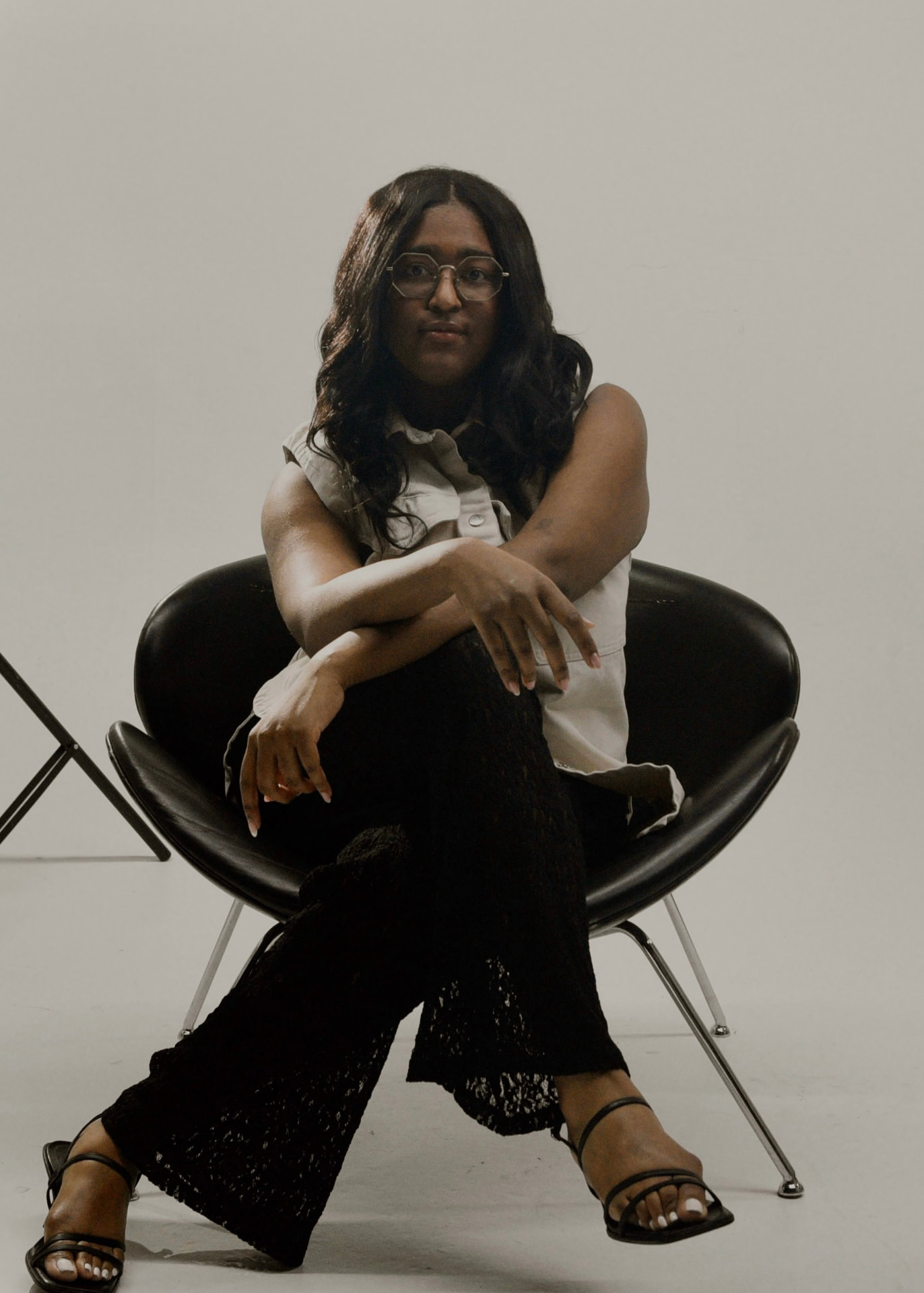 Artisha Walker seated in a studio portrait